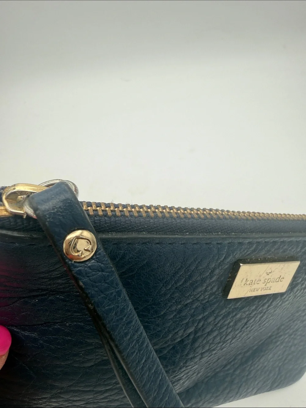 kate spade navy pebbled leather wristlet wi/  gold logo 6.5x4”